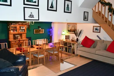 Coin salon dans l'établissement La Maison du Chene
