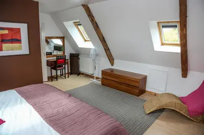 Un ou plusieurs lits dans un hébergement de l'établissement La Maison du Chene