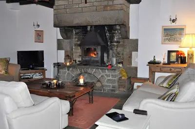 Coin salon dans l'établissement La Maison du Chene