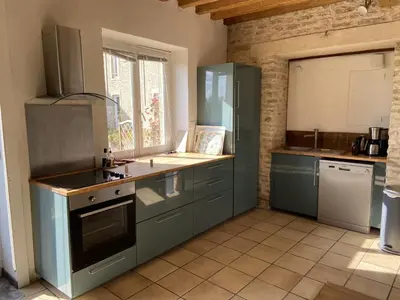 Cuisine ou kitchenette dans l'établissement FamilyGites