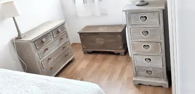 Un ou plusieurs lits dans un hébergement de l'établissement Appartement charmant à Cabourg avec piscine partagée (24 m²)