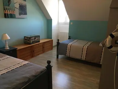 Un ou plusieurs lits dans un hébergement de l'établissement Villa Cotentin