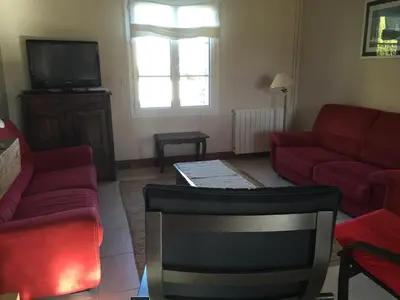 Coin salon dans l'établissement Villa Cotentin