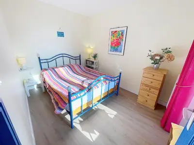 Un ou plusieurs lits dans un hébergement de l'établissement Appartement T2 avec ascenseur, hypercentre, à 50m de la plage, WIFI, TV connectée, linge en option - FR-1-361-4