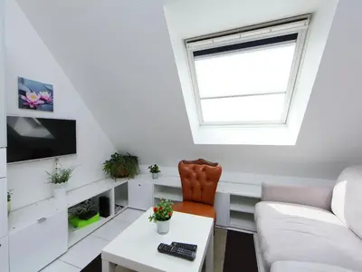 Télévision ou salle de divertissement dans l'établissement Apartment La Guillaumière-1 by Interhome