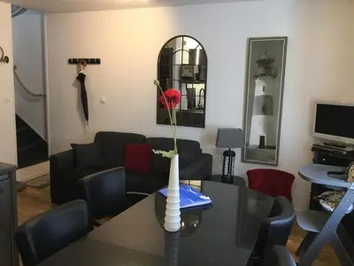 Télévision ou salle de divertissement dans l'établissement Maison de pêcheur