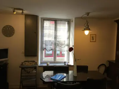 Télévision ou salle de divertissement dans l'établissement Maison de pêcheur