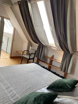 Un ou plusieurs lits dans un hébergement de l'établissement Ô LOFT