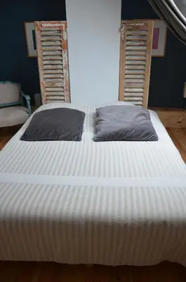 Un ou plusieurs lits dans un hébergement de l'établissement Ô LOFT