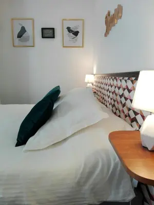 Un ou plusieurs lits dans un hébergement de l'établissement Mont B&B