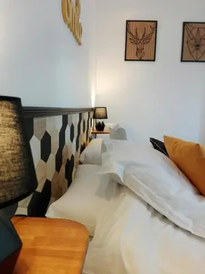 Un ou plusieurs lits dans un hébergement de l'établissement Mont B&B