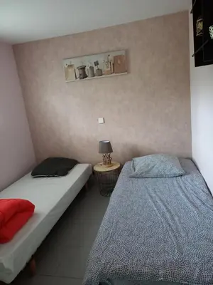 Un ou plusieurs lits dans un hébergement de l'établissement Le Relais De La Chaussee