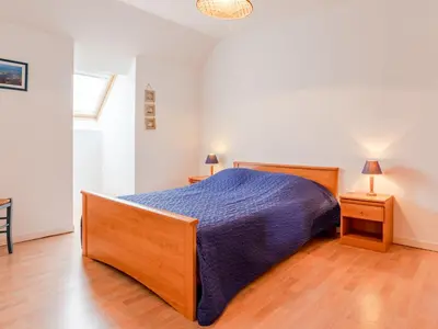 Un ou plusieurs lits dans un hébergement de l'établissement Holiday Home Néroli by Interhome