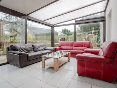 Coin salon dans l'établissement Holiday Home Les Mésanges by Interhome