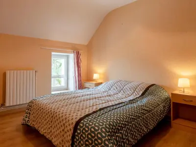 Un ou plusieurs lits dans un hébergement de l'établissement Holiday Home Les Mésanges by Interhome