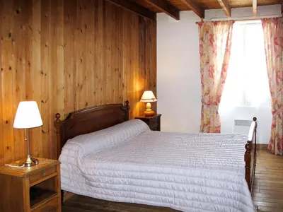 Un ou plusieurs lits dans un hébergement de l'établissement Holiday Home La Bonneraie by Interhome