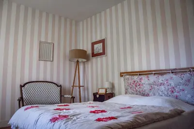Un ou plusieurs lits dans un hébergement de l'établissement Utah Beach Chambre hote
