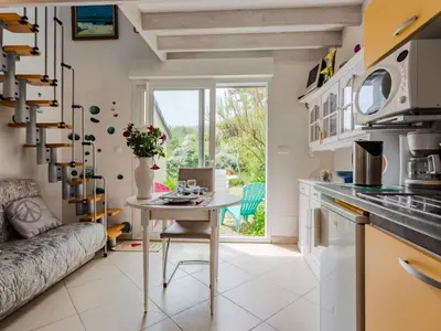 Cuisine ou kitchenette dans l'établissement Holiday Home La Plage by Interhome