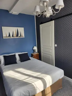 Un ou plusieurs lits dans un hébergement de l'établissement Hotel Saint Etienne