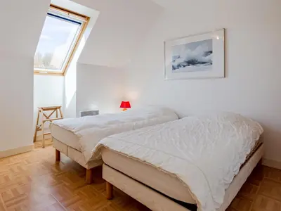 Un ou plusieurs lits dans un hébergement de l'établissement Holiday Home Neptune by Interhome