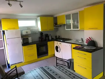 Cuisine ou kitchenette dans l'établissement La Cornaline 1