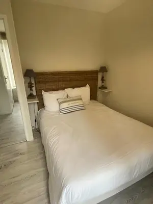 Un ou plusieurs lits dans un hébergement de l'établissement Arromanches D-Day Cottage