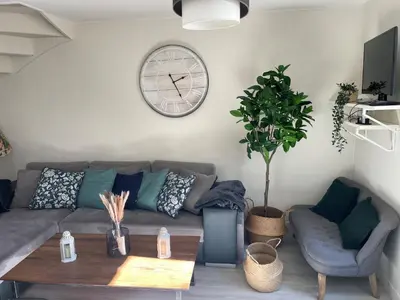 Télévision ou salle de divertissement dans l'établissement Arromanches D-Day Cottage