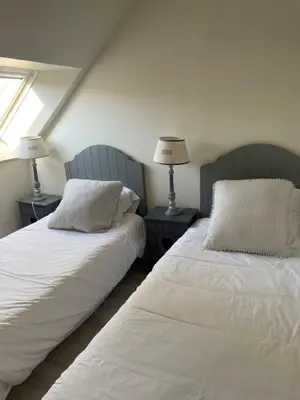 Un ou plusieurs lits dans un hébergement de l'établissement Arromanches D-Day Cottage