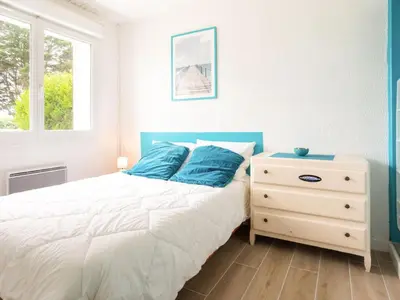 Un ou plusieurs lits dans un hébergement de l'établissement Holiday Home Les mielles by Interhome