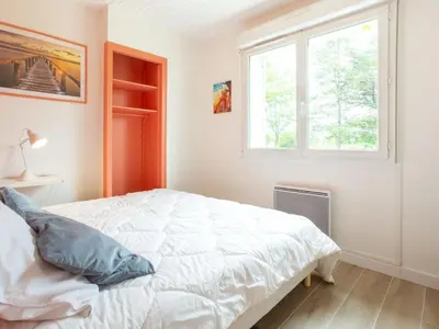 Un ou plusieurs lits dans un hébergement de l'établissement Holiday Home Les mielles by Interhome