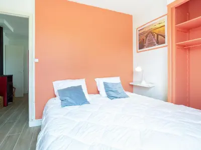 Un ou plusieurs lits dans un hébergement de l'établissement Holiday Home Les mielles by Interhome