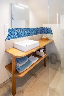 Salle de bains dans l'établissement Petite Emeraude