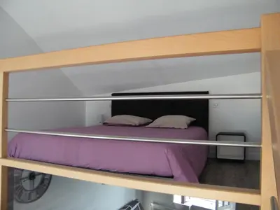 Un ou plusieurs lits dans un hébergement de l'établissement Bel appartement vue sur mer