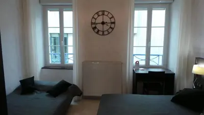 Un ou plusieurs lits dans un hébergement de l'établissement Hotel La Renaissance