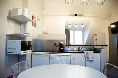 Cuisine ou kitchenette dans l'établissement Smartappart Cherbourg (la rose des vents)