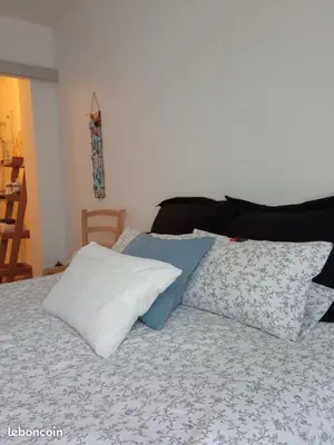 Un ou plusieurs lits dans un hébergement de l'établissement Chambre et petit déjeuner près de la mer