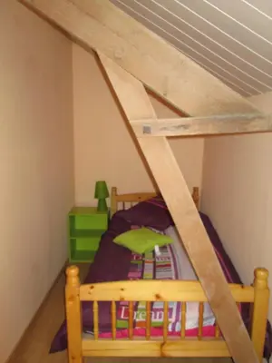 Un ou plusieurs lits dans un hébergement de l'établissement La Ferme de la Petite Noé