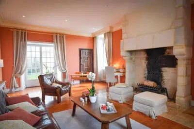 Coin salon dans l'établissement Domaine de La Ramée