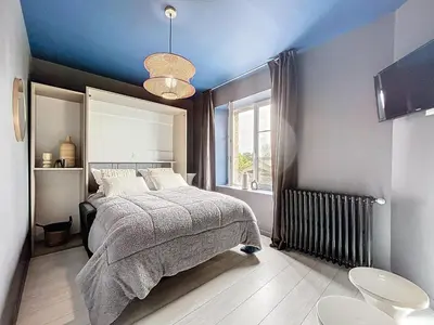 Un ou plusieurs lits dans un hébergement de l'établissement Appart Hôtel de la baie