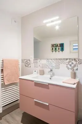 Salle de bains dans l'établissement Le Cottage De La Baie