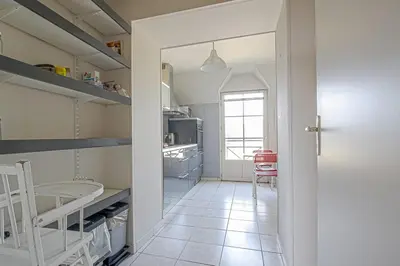 Cuisine ou kitchenette dans l'établissement IKE'S Deluxe APARTMENT in Bayeux