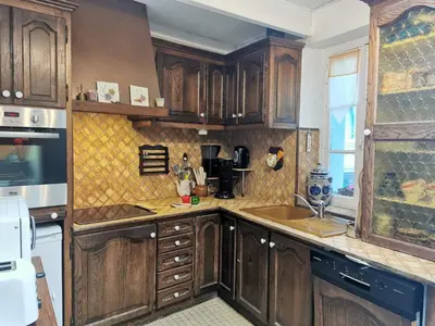 Cuisine ou kitchenette dans l'établissement Holiday Home La Congrière by Interhome