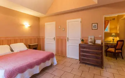 Un ou plusieurs lits dans un hébergement de l'établissement Chambre Melody