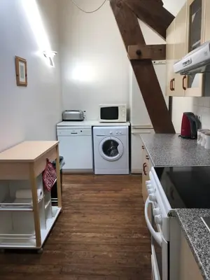 Cuisine ou kitchenette dans l'établissement Gites in Le Neufbourg -Mortain