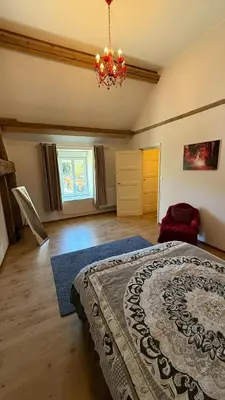 Un ou plusieurs lits dans un hébergement de l'établissement Maison la touchardiere