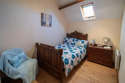 Un ou plusieurs lits dans un hébergement de l'établissement Maison la touchardiere
