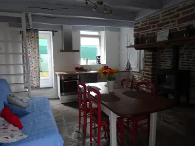 Coin salon dans l'établissement La Cour du Bourg
