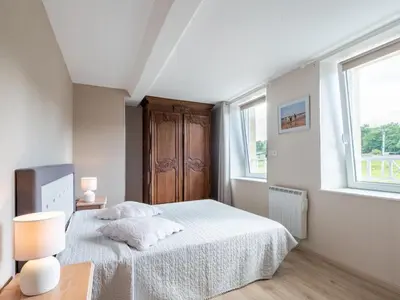 Un ou plusieurs lits dans un hébergement de l'établissement Holiday Home Le Repos by Interhome