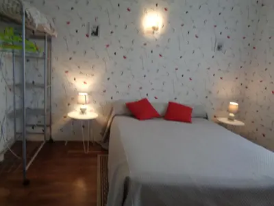 Un ou plusieurs lits dans un hébergement de l'établissement chambre d'hôte