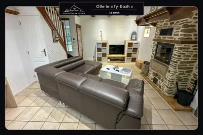 Télévision ou salle de divertissement dans l'établissement Aux portes de la baie - Vieux-Viel